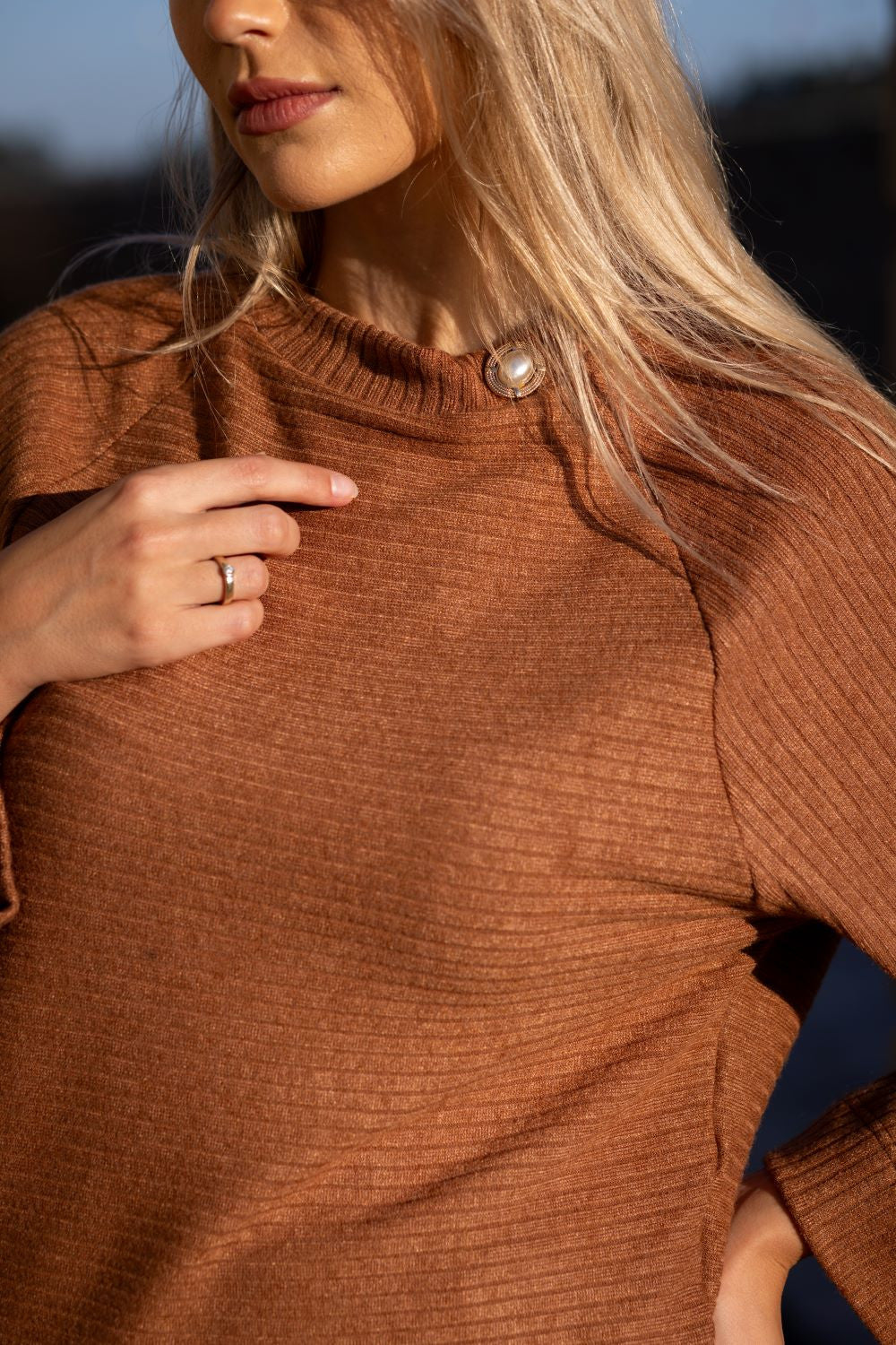 CONJUNTO EM MALHA BLUSA E SAIA